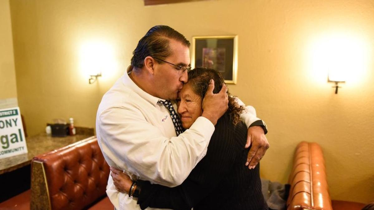 Modesto City Councilman Tony Madrigal hugs his mother, Elena Madrigal, as election returns come in Tuesday night, Nov. 11, 2017