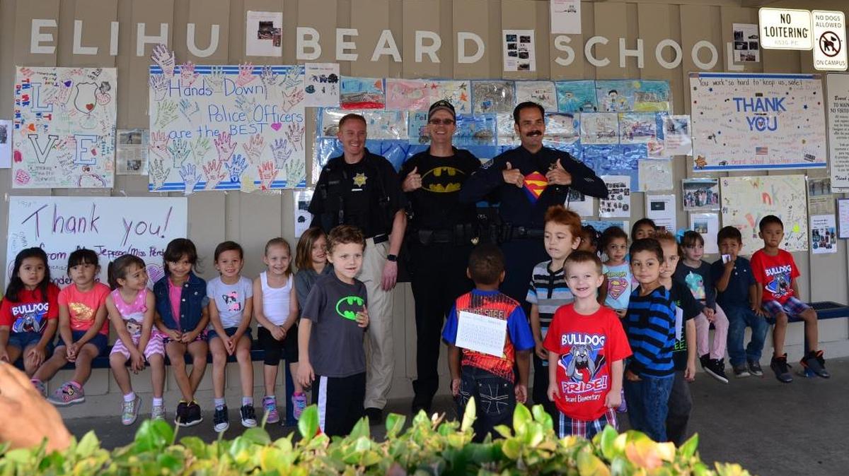From left, Stanislaus County Sheriff’s Department Sgt. Josh Humble, Capt. Jim Gordon and Modesto police Detective Sean Dodge get ready for a morning run with the kids from Beard Elementary School on Friday, Sept. 16, 2016.