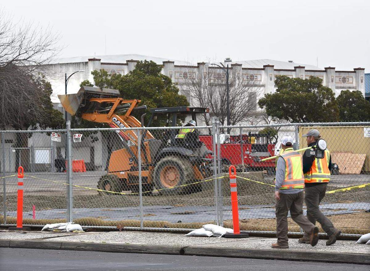 Survey crews are pictured Wednesday morning January 10, 2018 at the site of the new Modesto Courthouse on H street between Ninth and 10th streets in downtown Modesto, Calif.
