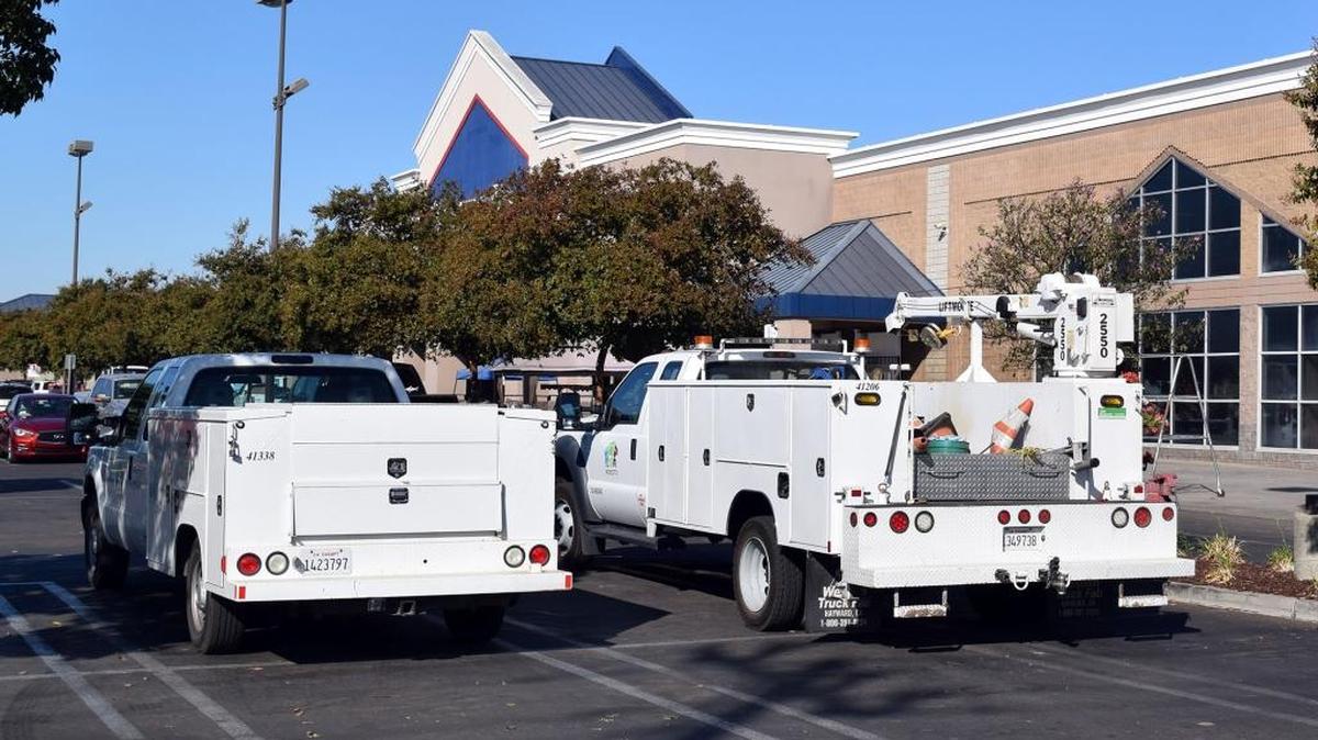 City of Modesto trucks are pictured in the parking lot of Lowe’s on Wednesday, Oct. 12, 2016, in north Modesto, Calif.