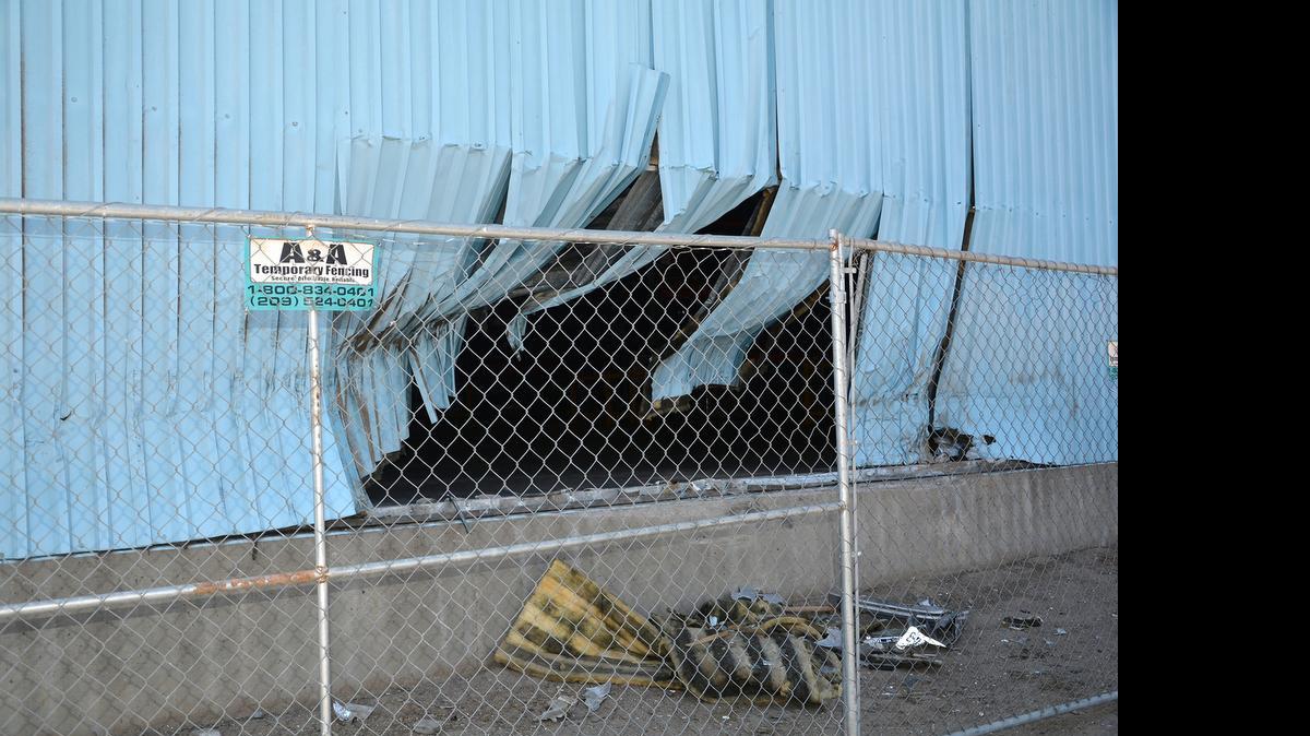 
Two men suffered major injuries when they crashed a car at high speeds into the Sciabica Olive Oil Building on Yosemite Boulevard early Monday morning July 13, 2015.
