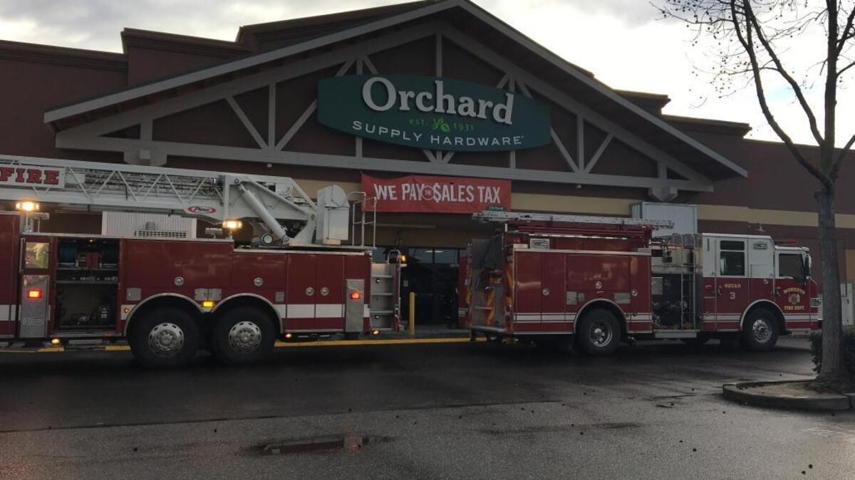 Modesto firefighters remained on scene at Orchard Supply Hardware on Saturday morning after a machine malfunctioned and filled the business with smoke.