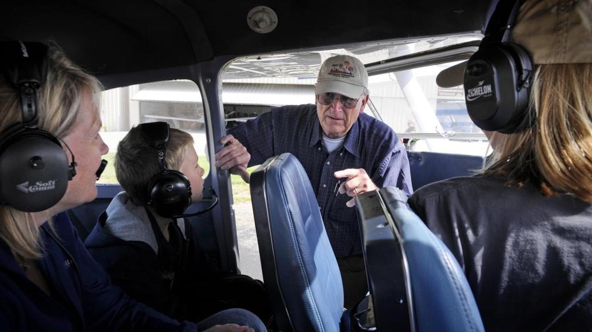 In April 2011, Leon Shaeffer gives flight instructions to passengers Apryl Neal and her children, Chandler and Autumn, prior to taking off at the Experimental Aircraft Association Chapter 90’s annual Young Eagles Flight Rally at the Oakdale Airport. Shaeffer was the pilot killed when his experimental aircraft crashed at the airport Saturday.
