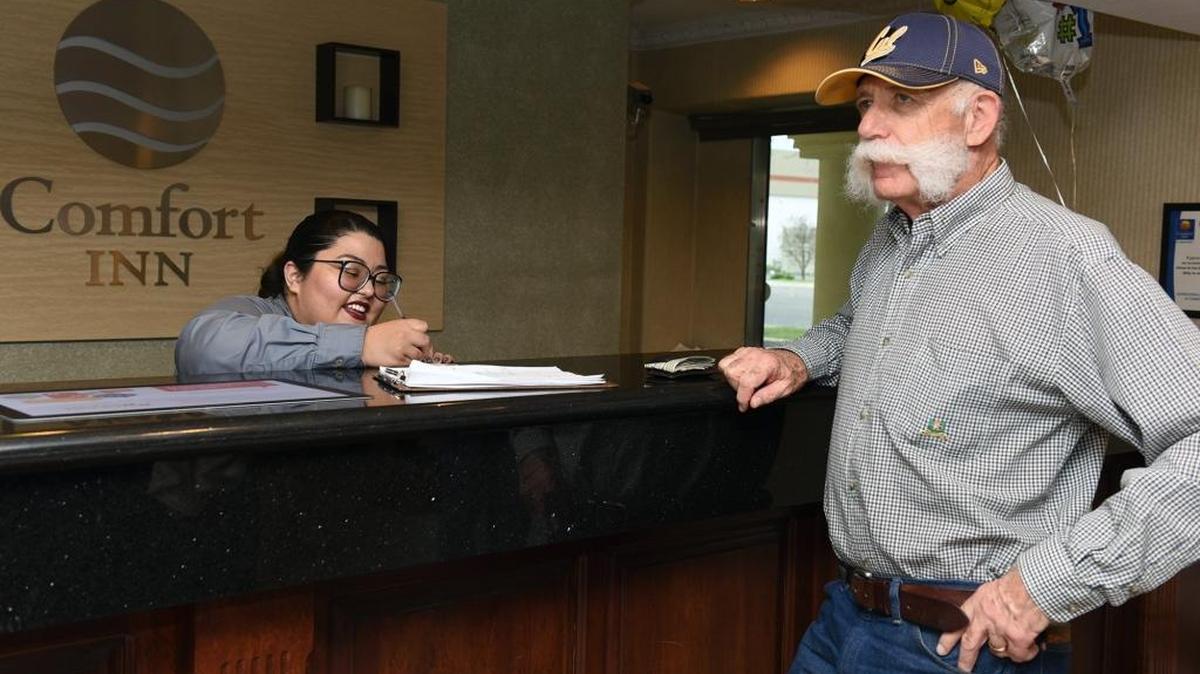 Rose Patch with guest services at Comfort Inn checks in Paul Carlisle on Friday, March 4, 2016, at the hotel on Sisk Road in Modesto.