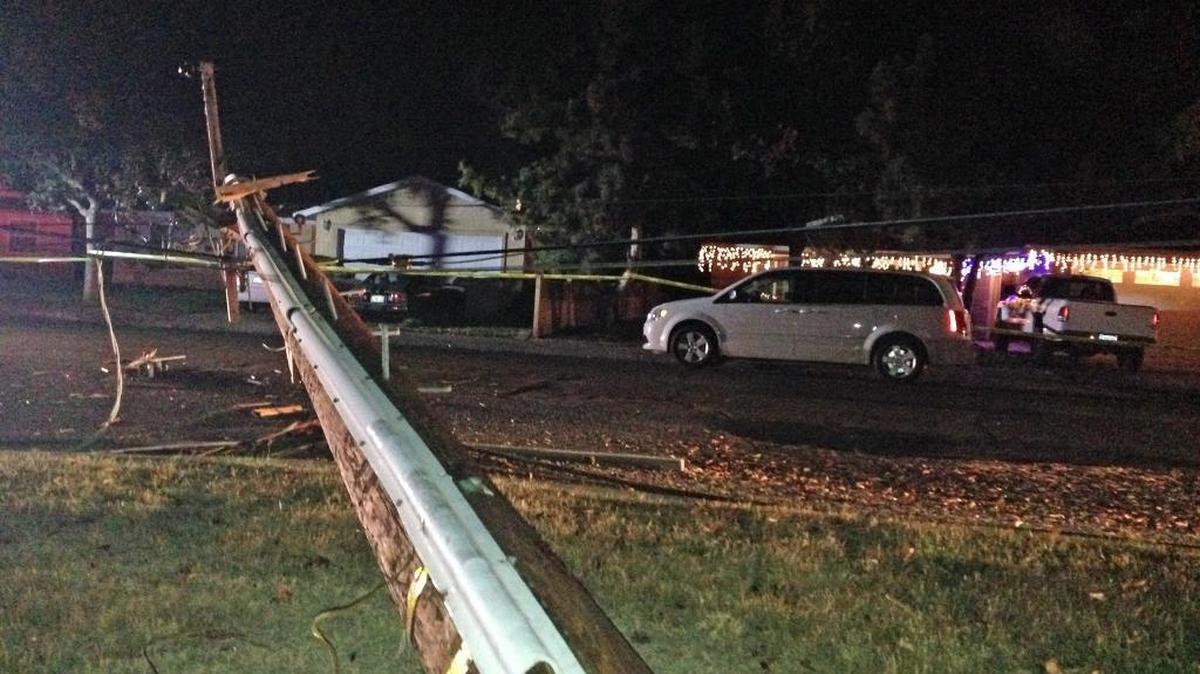 A driver speeding in west Modesto lost control of his vehicle on Tuesday, Dec. 1, 2015, and crashed into a power pole. The pole fell across Torrid Avenue near Jayhawk Way. At least six homes on Jayhawk were expected to be without power for the evening.