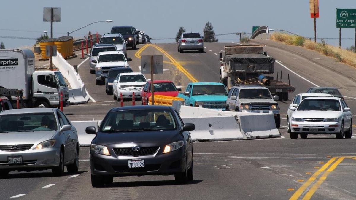 Cars head east on the Pelandale Avenue overpass at the Sisk Road intersection during roadwork in 2014.