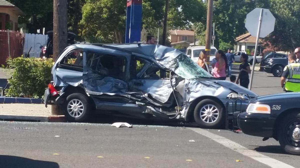 Turlock Police Department officers investigated a two-vehicle collision on Tuesday that left a delivery truck on its side.