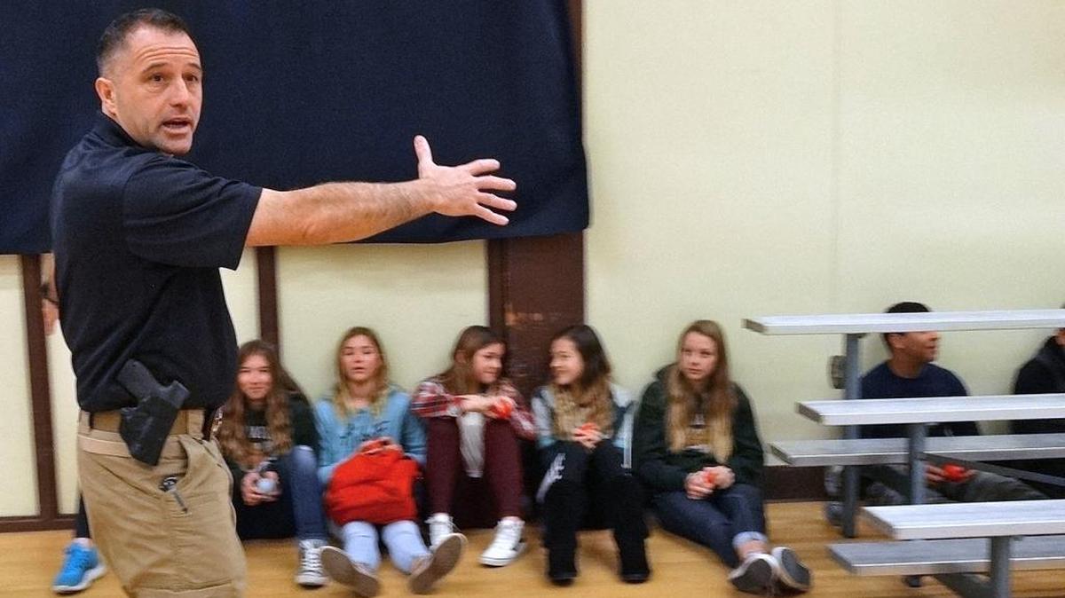 Sonora police Lt. Turu VanderWiel and Tuolumne County sheriff’s Sgt. Jim Oliver gave ALICE (Alert, Lock down, Inform, Counter, Evacuate) training to fourth-, fifth- and eighth-grade students at Sonora Elementary School on Monday morning, Jan. 30, 2017. Here, VanderWiel gestures to show that students who group together to hide put themselves at higher risk. The training helps schools prepare for an event such as an aggressive intruder or an active shooter on campus.