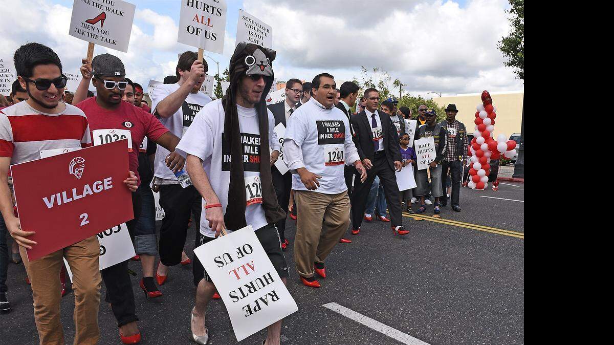 
Men leave the starting line for the Haven Women’s Center’s Walk a Mile in Her Shoes event Saturday to raise awareness and funds to fight domestic violence and sexual assault.
