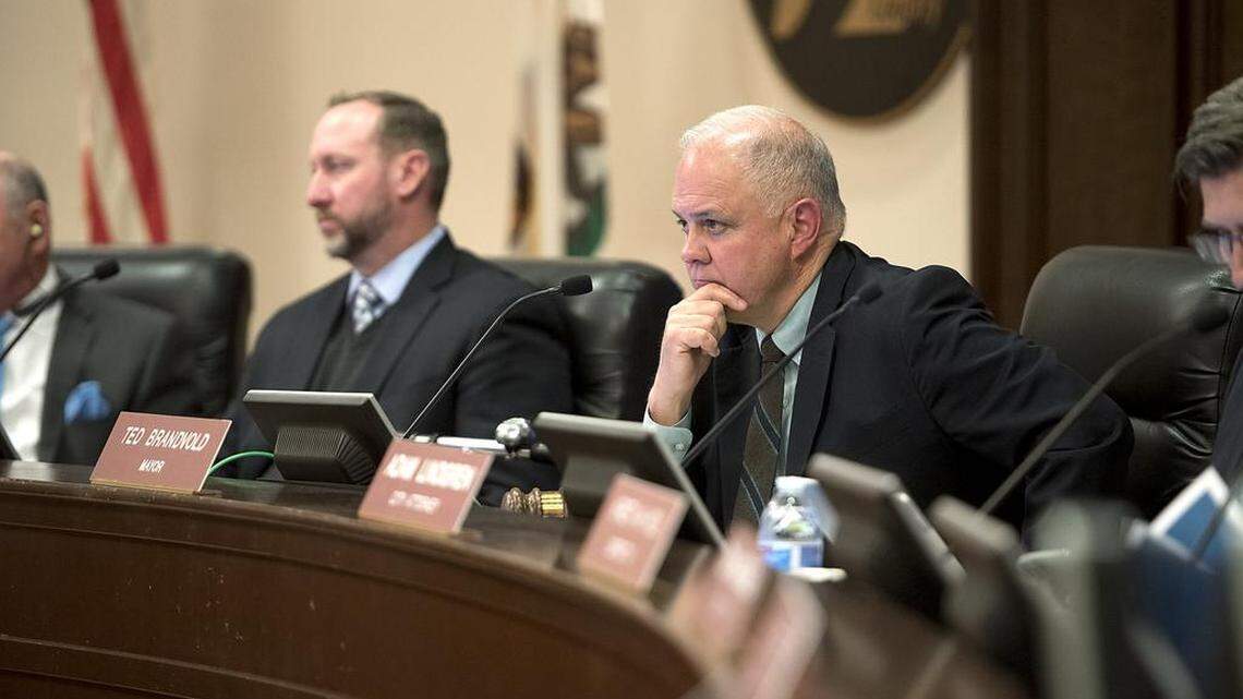 Modesto mayor Ted Brandvold listens to the presentation from Focus on Prevention on the plan for a temporary low-barrier homeless shelter during a council meeting in February.