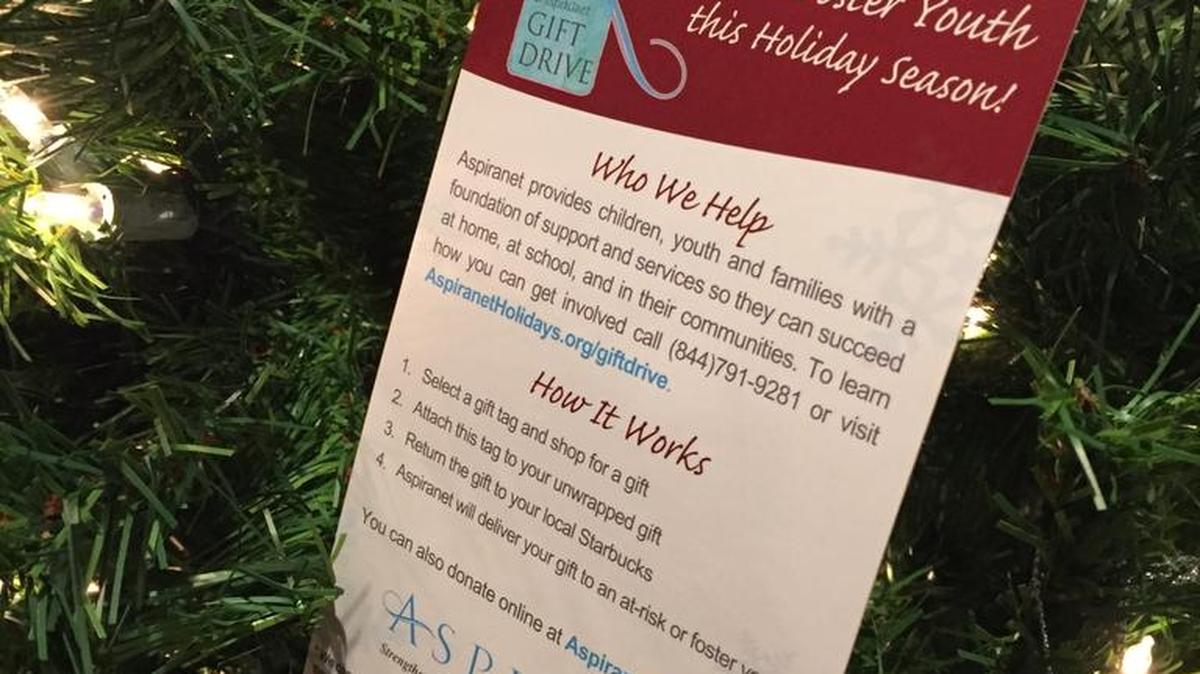 In a partnership with Aspiranet, area Starbucks coffee shops have trees displaying gift tags to help foster children this holiday season.