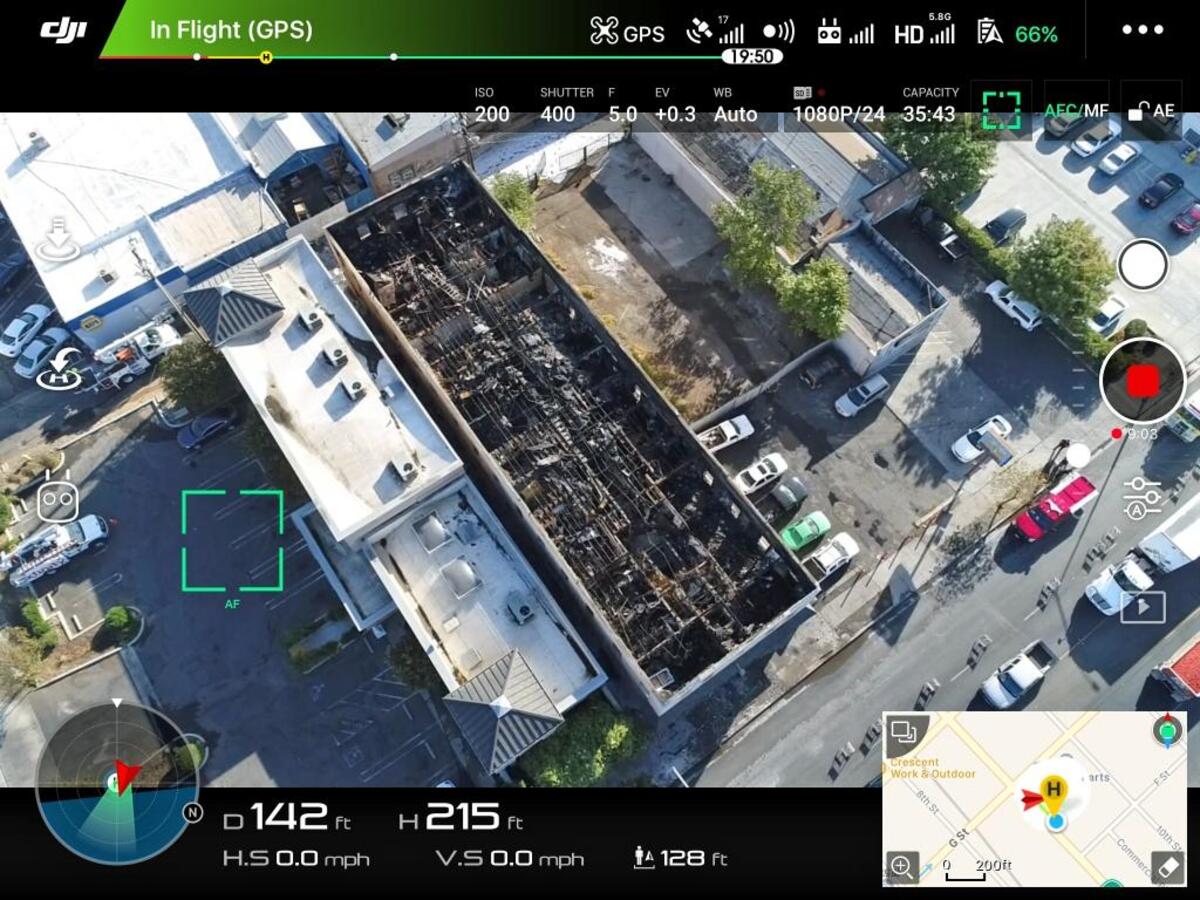 An aerial view of the apartment building on 624 Ninth Street in Modesto, California, on Tuesday, Oct. 3, 2017, a day after a fire tore through the building.