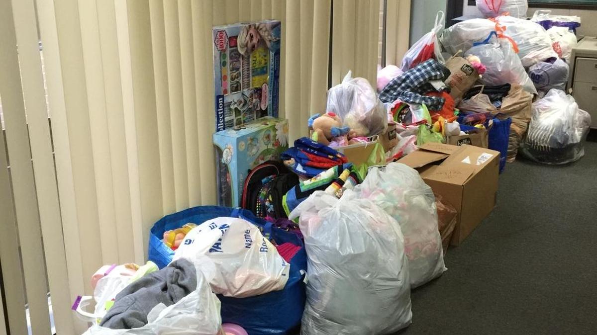 The community donated bags of clothes and other items to seven children who were removed from a filthy home by Child Protective Services earlier this month. One woman donated seven quilts, one for each child.