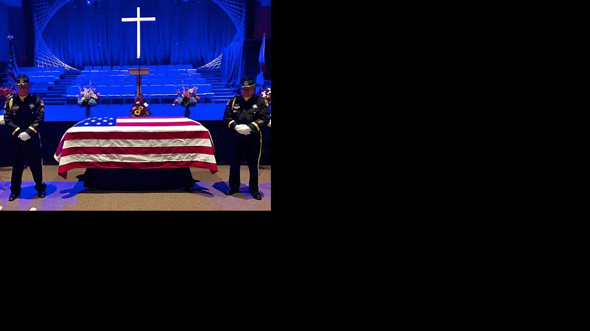 The casket of fallen Stanislaus County Sheriff's Department Deputy Dennis Wallace at CrossPoint Community Church in Modesto, Calif., on Tuesday, Nov. 22, 2016.