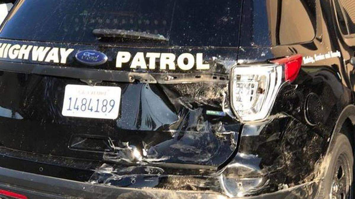 On Friday, Dec. 8, 2017, a CHP officer was in the center divide on northbound Highway 99 north of Taylor Road in Turlock, Calif.. He was just about to get out of his patrol vehicle to remove a sheet of plywood from the fast lane when his car was struck from the rear by another vehicle.