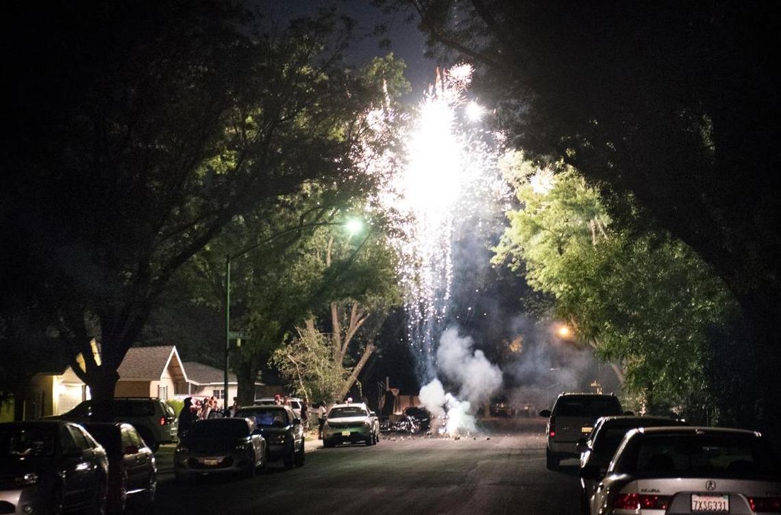 Illegal fireworks light up Bay Meadows Drive in Modesto, Calif., on Tuesday, July 4, 2017.