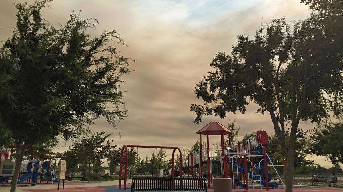 
It was a hazy morning at Freedom Park in Modesto on Friday, Sept. 11, 2015, on a day that was expected to reach more than 100 degrees and when smoke from a massive fire in Amador and Calaveras counties began encroaching on the foothills to the east of Stanislaus County.
