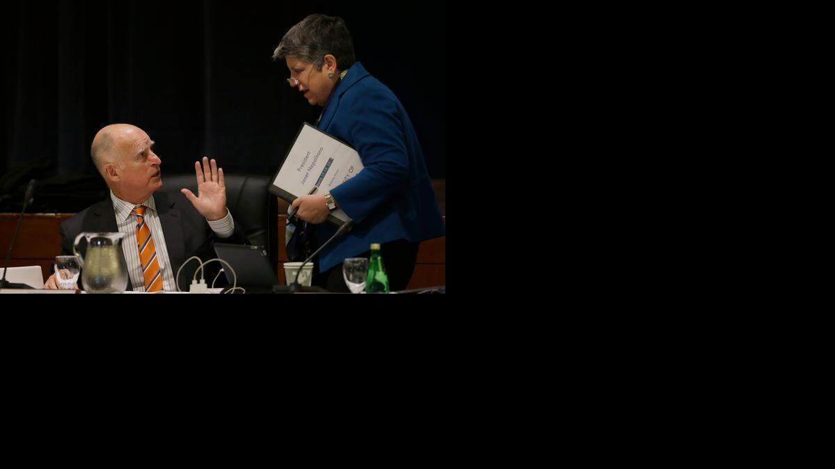 
Gov. Jerry Brown greets University of California president Janet Napolitano during a UC Board of Regents meeting in San Francisco last week. Brown has opposed Napolitano’s plan to increase tuition by up to 5 percent in each of the next five years.
