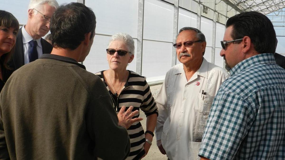 McCarthy alongside Arturo Rodriguez, president of the United Farm Workers, on Tuesday meets with Jack Esformes, left, and Mike Carr of Pacific Triple E Farm, which produces walnuts, almonds, cherries and tomatoes.