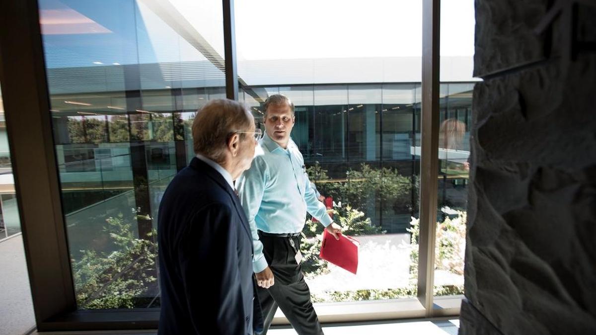 Gallo engineering VP Mike Roland, right, gives Joe Gallo a tour of the new Dry Creek office building at E.&J. Gallo Winery in Modesto in August.