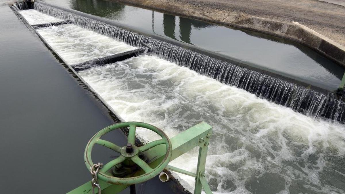 A canal near Emerald Avenue and Maze Boulevard in Modesto is full of irrigation water in April 2014.