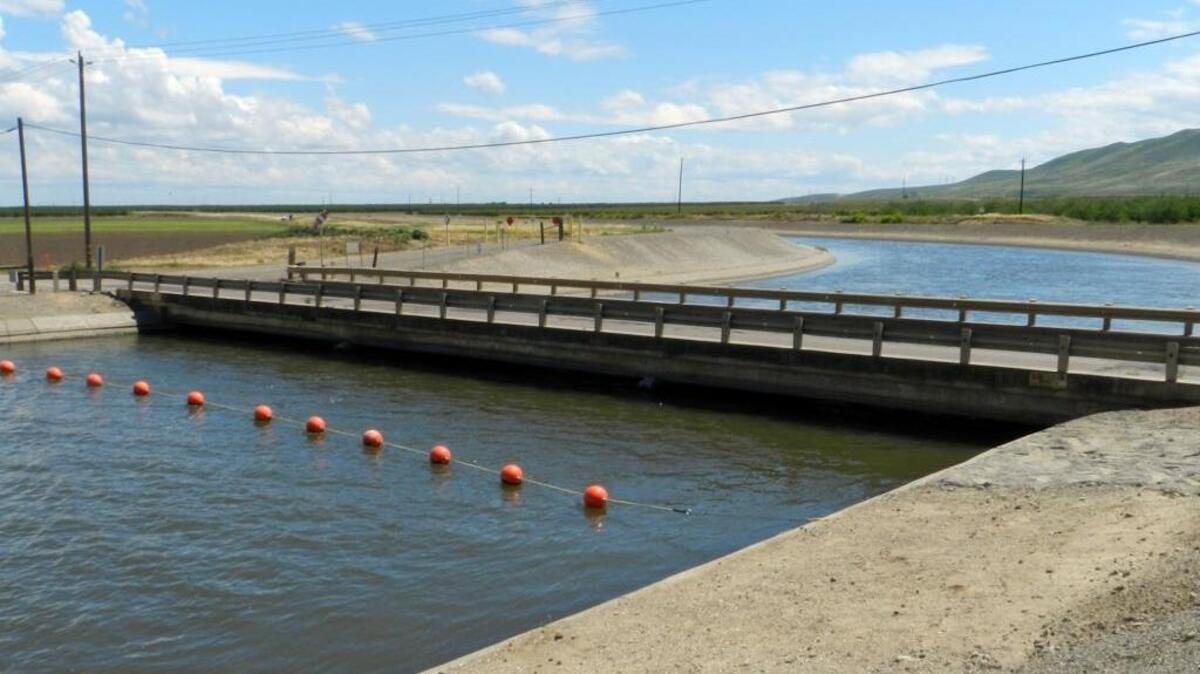 The federal Delta-Mendota Canal flows under Howard road near Westley, Calif., on Wednesday, (04-12-17). The canal is owned by the U.S. Bureau of Reclamation, which on Tuesday restored full water deliveries to the last of the irrigation districts that had been cut back because of drought and fish protections.