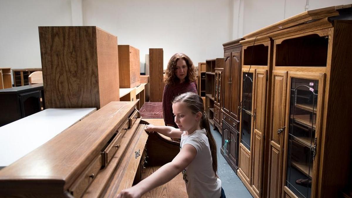 Jayda Cushenberry, 9, looks at a roll top desk with her grandmother Ursula Weatherford at Habitat for Humanity’s ReStore outlet on Kearney Avenue in Modesto, Calif., on Thursday, June 15, 2016.