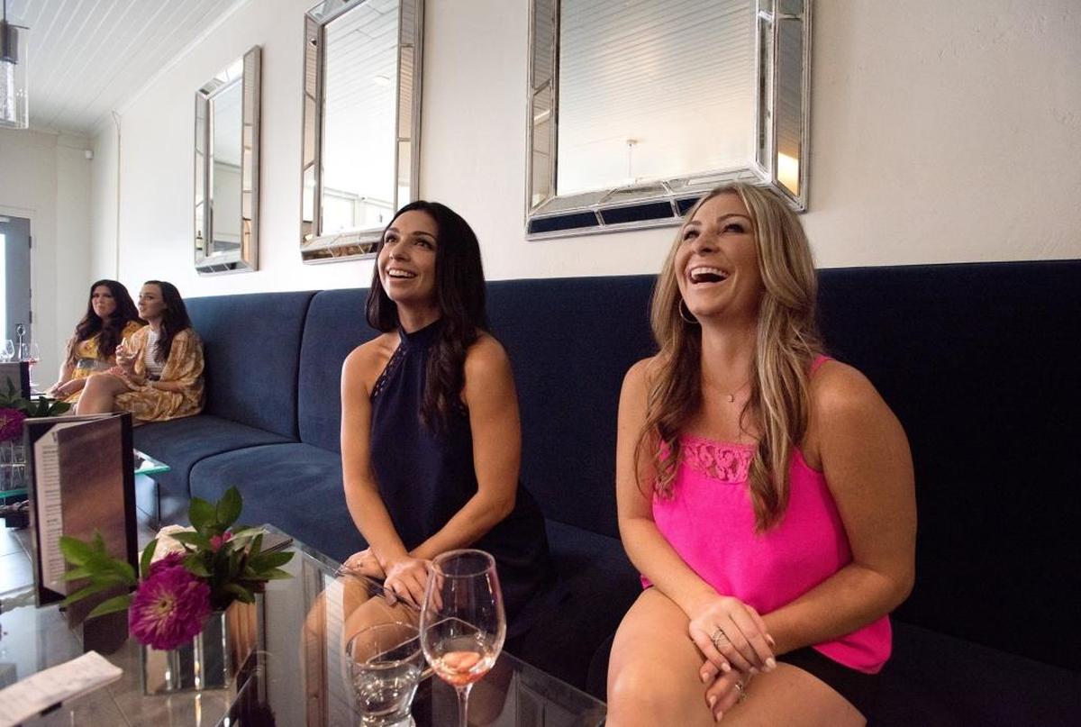 Owners Kara Bogetti, right, and Merissa Deming, left, at The Vault wine lounge on 111 East Main Street in Ripon Calif., Saturday, July 28, 2018.