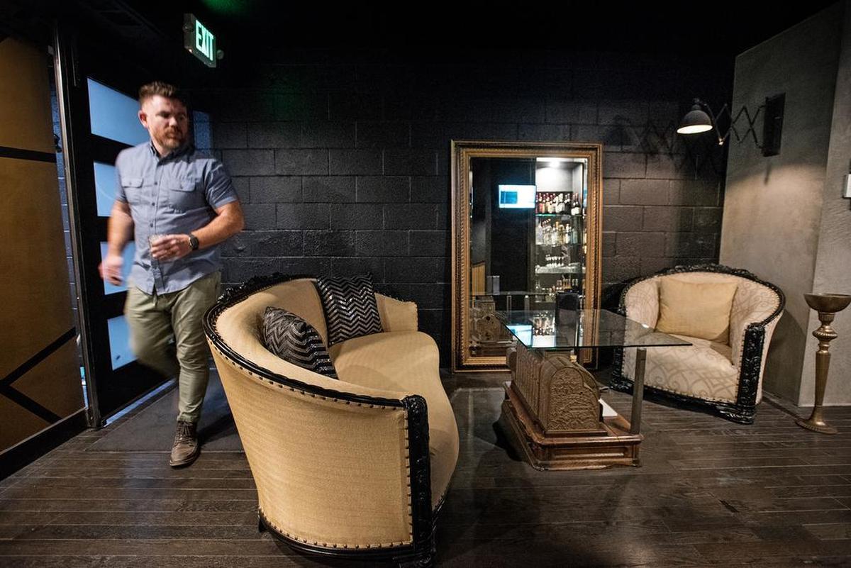 Owner Adam Soares custom made many of the fixtures and decor at Blades and Bottles in Modesto, Calif., Friday, Jan. 25, 2019.