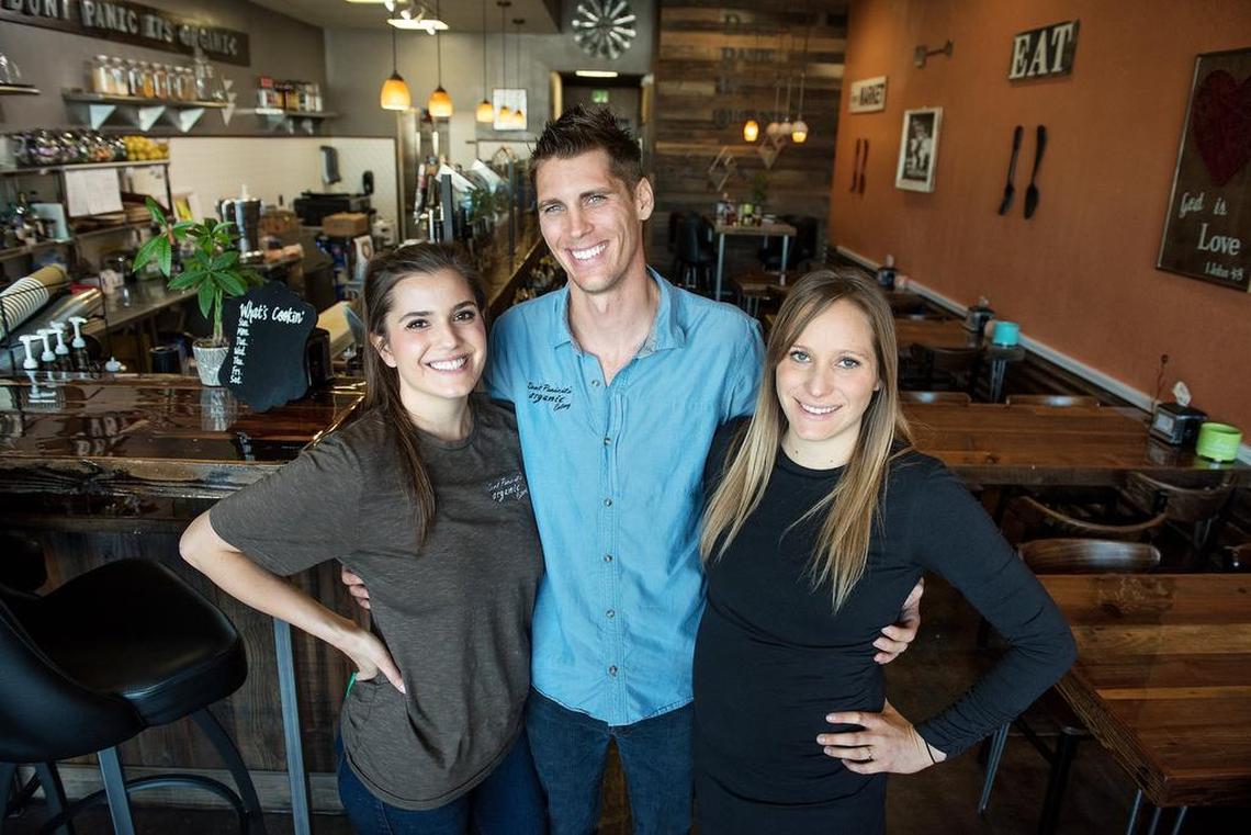 Siblings Sarah, left, and David Mingham, middle, and Katherine Bertolotti at Don’t Panic It’s Organic eatery in Hughson, Calif., Wednesday, Nov. 7, 2018.