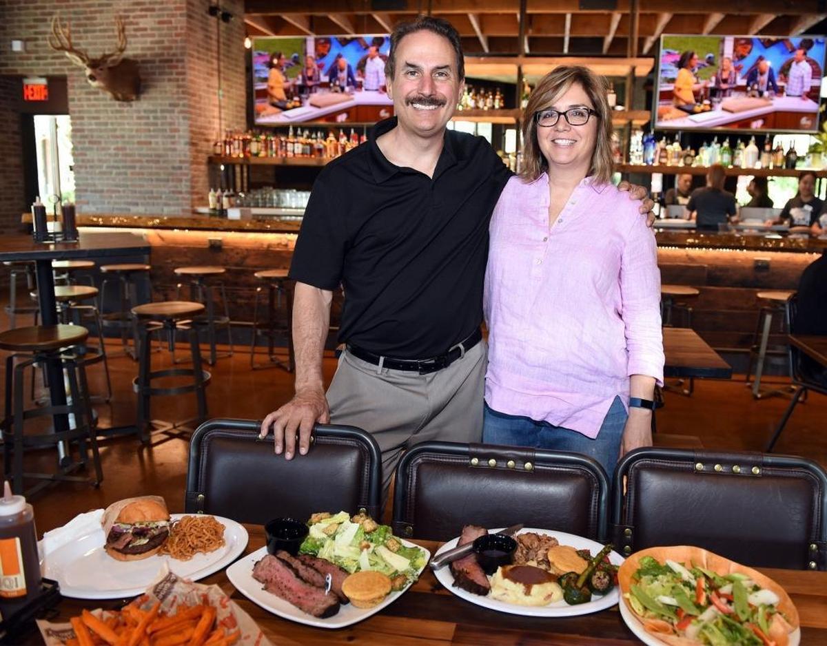 The new Buckhorn BBQ is opening at Vintage Faire Mall in Modesto, Calif. Owners Rich and Christine Loudermilk are pictured in the business on Thursday June 7, 2018.