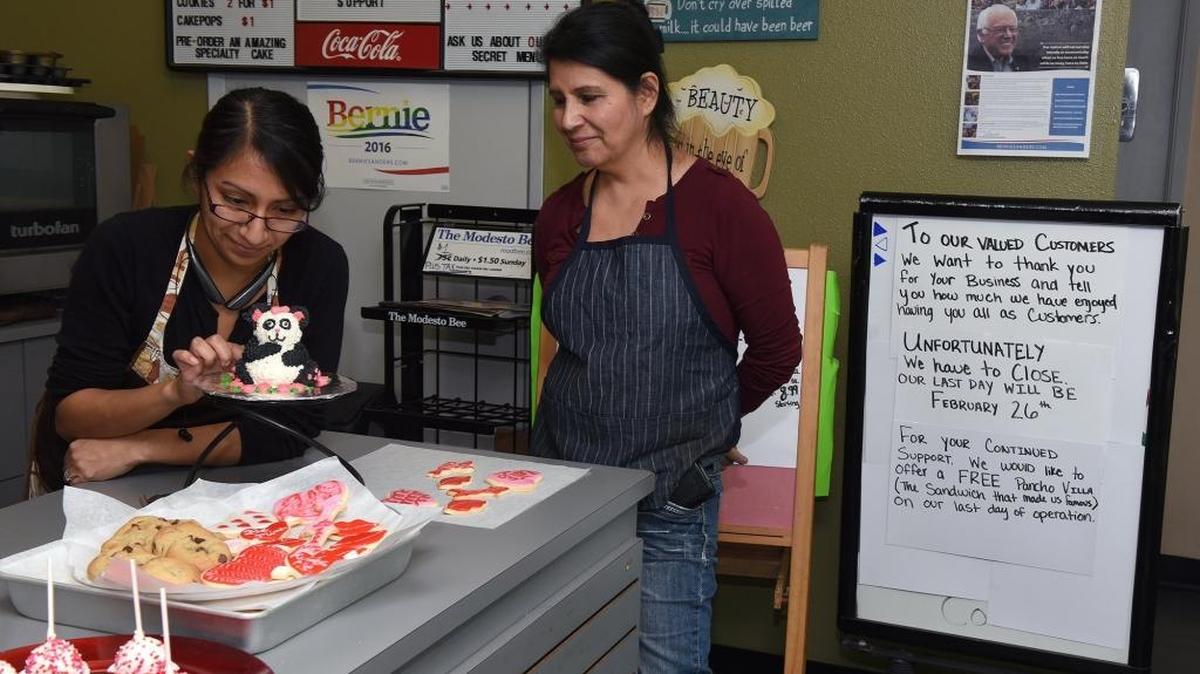 Aurelia Garcia, right, watches daughter Luz Gutierrez work on a pastry Thursday afternoon, Feb. 11, 2016, at Gourmet Fresh Deli-licious in Modesto. The deli will soon close after three years in business, but Gutierrez’s baking business will continue.