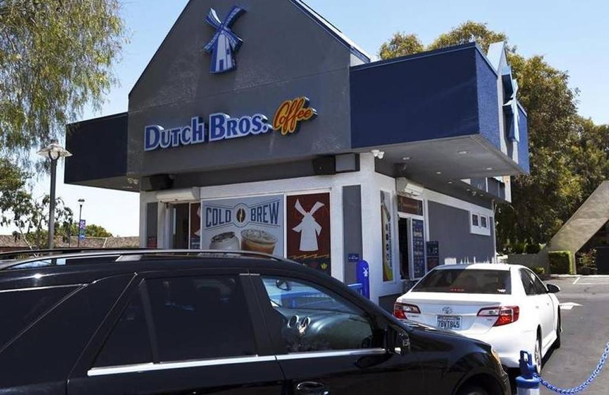 Cars line up at the Dutch Bros. drive-through kiosk at Bullard and West avenues in northwest Fresno, Calif.