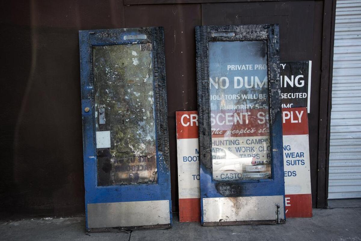 Fire scarred doors from the downtown Crescent Supply building are just a few items that have been salvaged from the burned out former location.