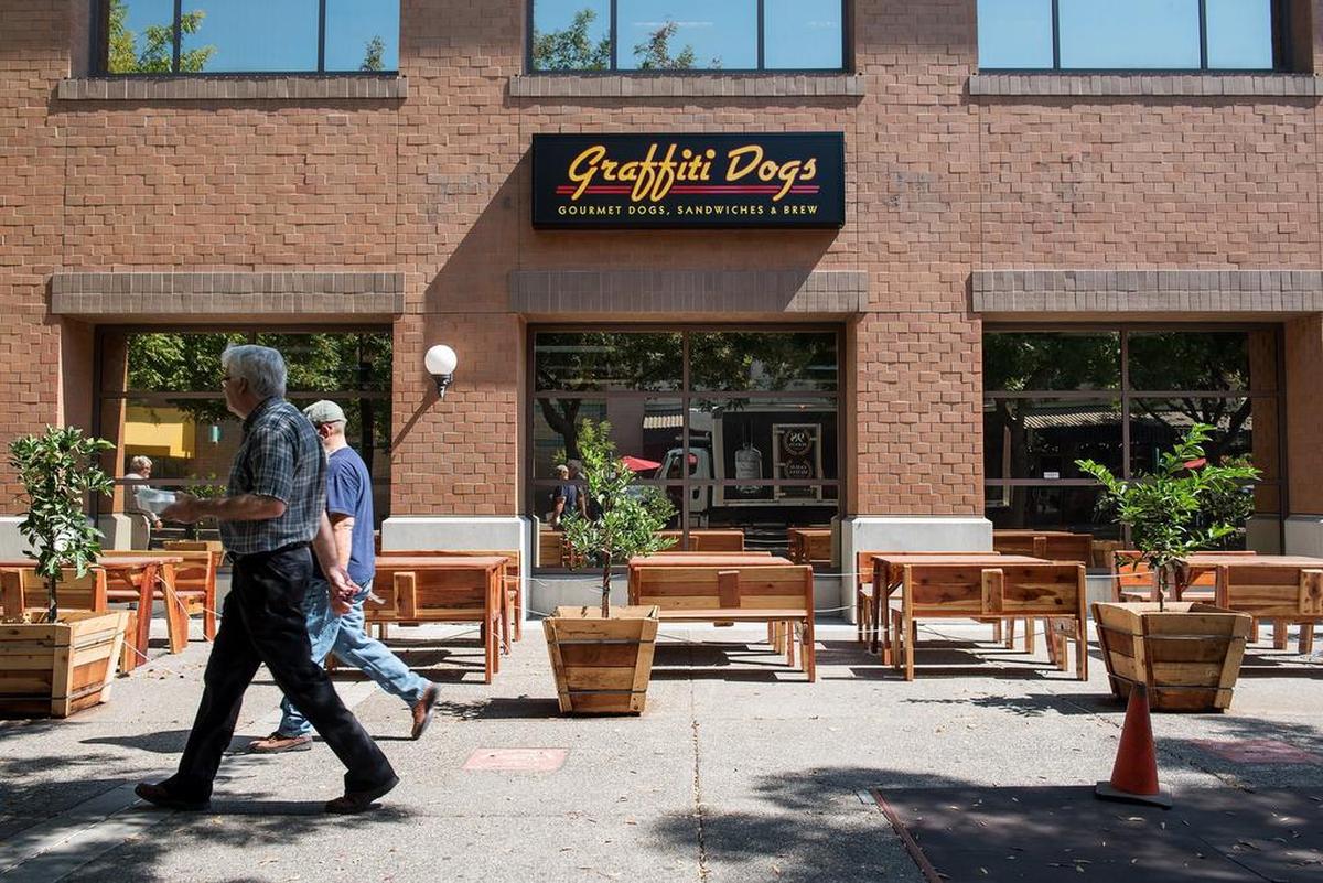 Graffiti Dogs restaurant at 10th Street Plaza in Modesto, Calif., on Thursday, September 6, 2018.