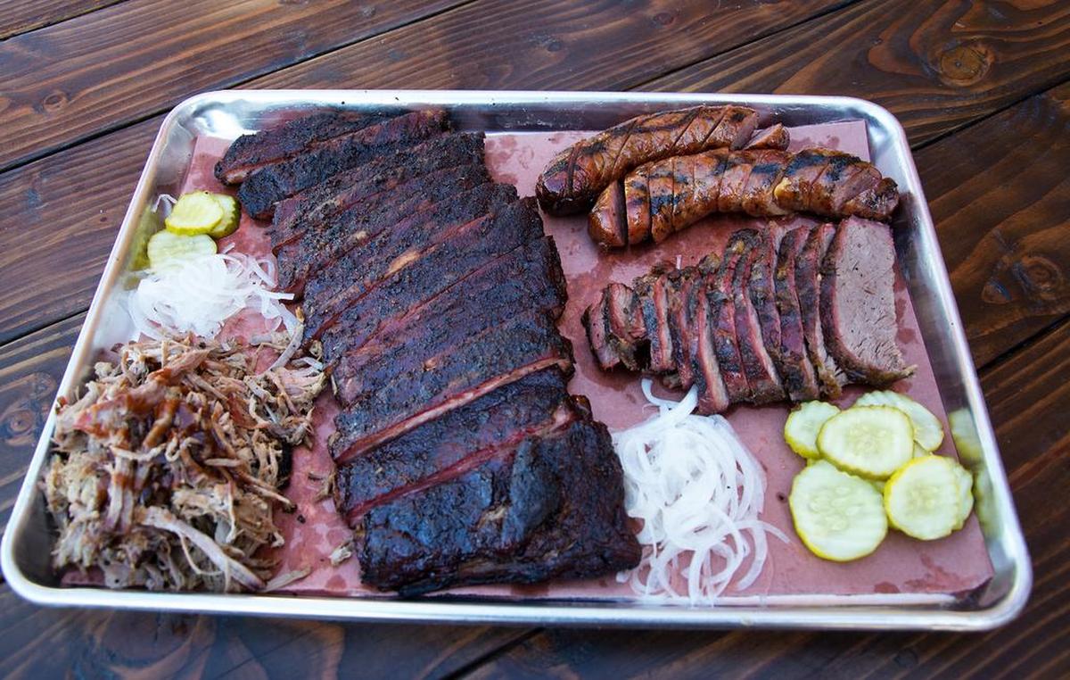A platter of smoked meats from Slick Fork BBQ in Hughson Friday, Sept. 21, 2018.