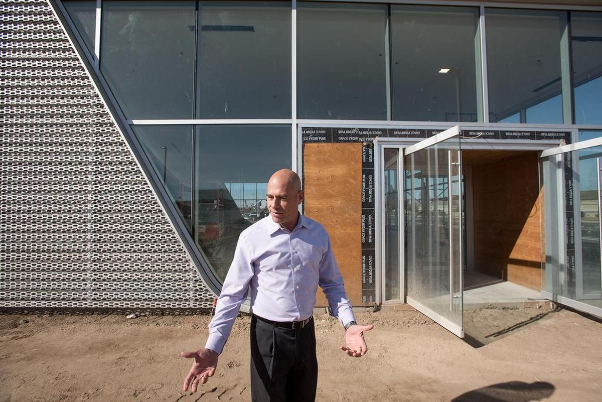 General Manager Mitchell Kudler stands outside what will be the showroom at the Audi dealership in Modesto, Calif., on Wednesday, Oct. 31, 2018.
