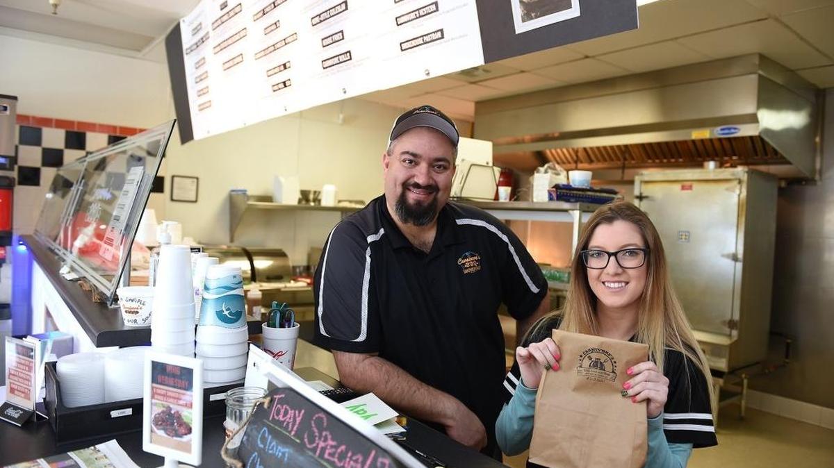 Owner Richard Aziz and employee Courtney Van Fleet are pictured Wednesday afternoon, Feb. 3, 2016, at Carnivore’s BBQ Sandwich Shop in Turlock.