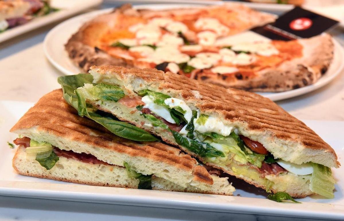 Panini and pizza are pictured Wednesday afternoon January 9, 2019 at Midici The Neapolitan Pizza Company at Vintage Faire Mall in Modesto, Calif.