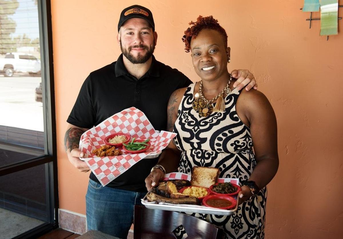 Owners Mike Ferreira, left, and Gia Smith at Fired Up Grill & Meal Prep at 1778 Mitchell Road in Ceres, Calif., Thursday, July 10, 2018.