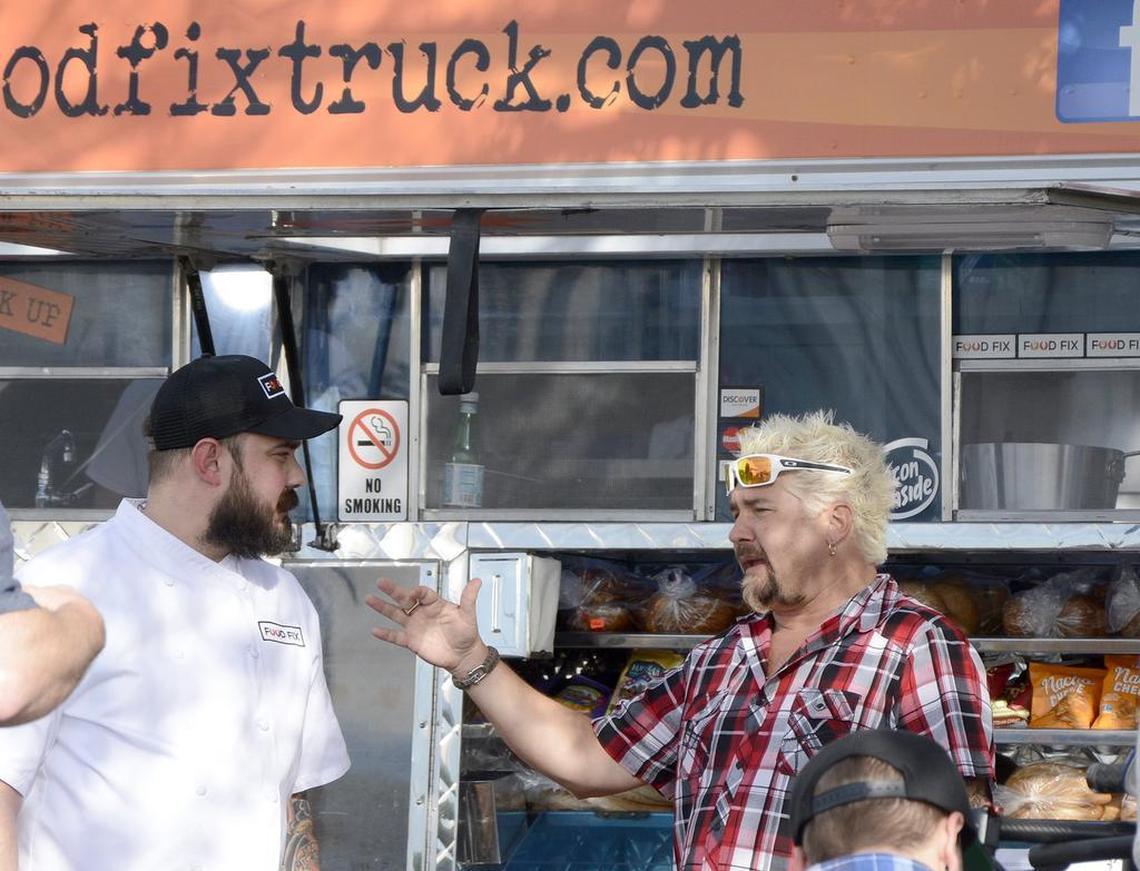 Food Network host and celebrity chef Guy Fieri films segments for his series “Diners, Drive-Ins and Dives” in Modesto on Jan. 20, 2016. He is pictured filming outside the Food Fix Truck with chef/owner Hank Olson.