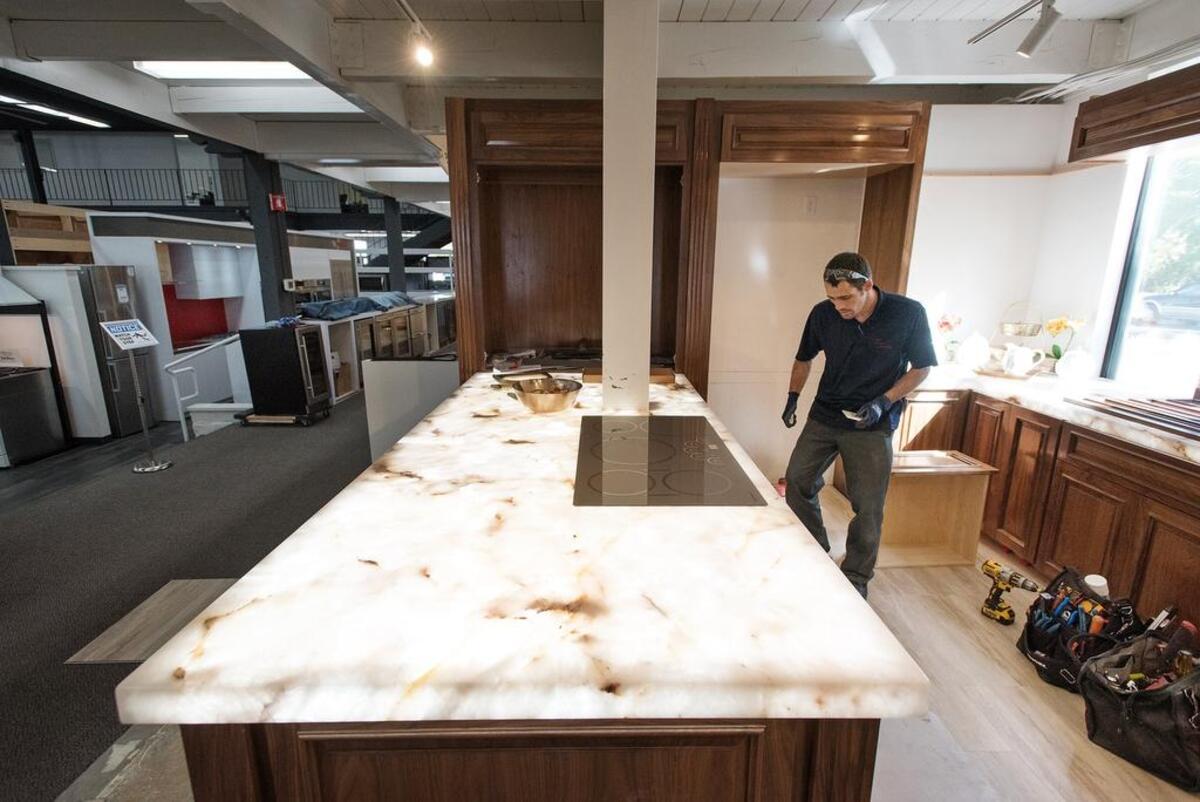 The Monogram kitchen showroom is being installed and includes a LED lighted countertop at Direct Appliance in Modesto, Calif., on Wednesday, Sept. 19, 2018.