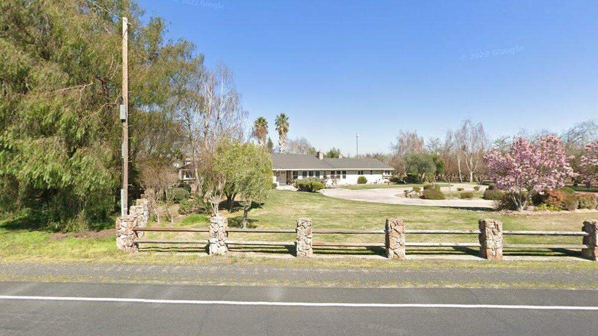 House on 21300 block of East River Road