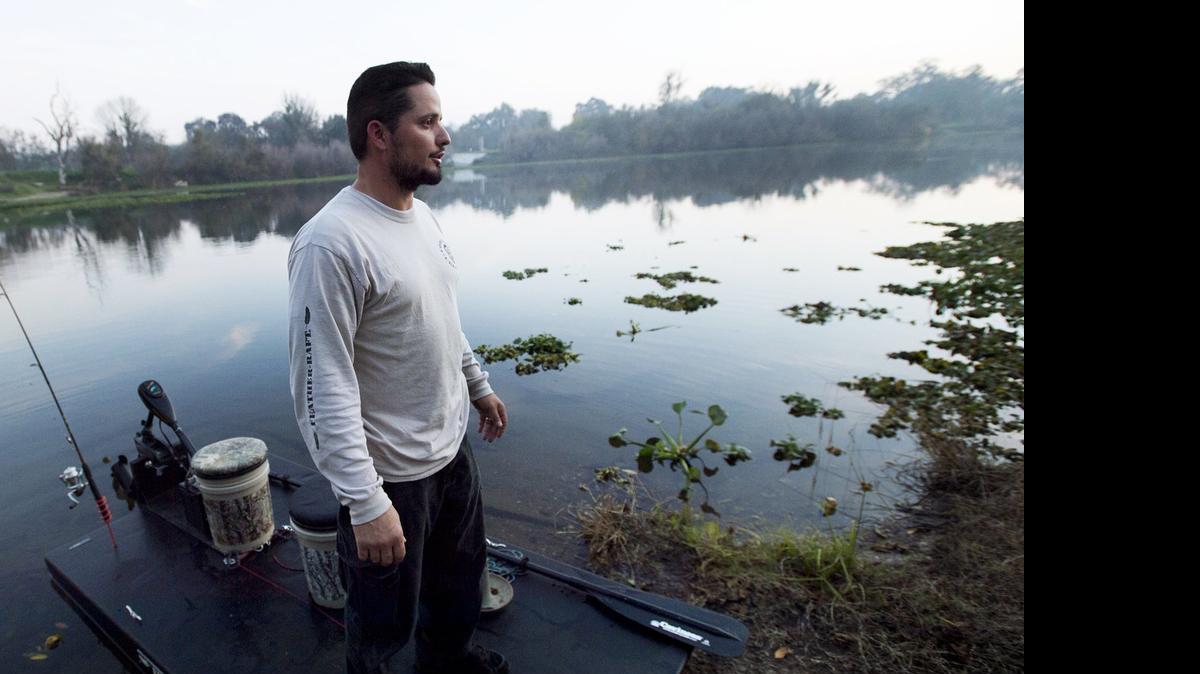 
Elias Ruiz of Hughson demonstrates his lightweight raft, the "Feather-Raft" along the Tuolumne River in Hughson, Calif., on Monday, December, 8, 2014. Ruiz won the first Stanislaus Innovation Challenge with his idea.
