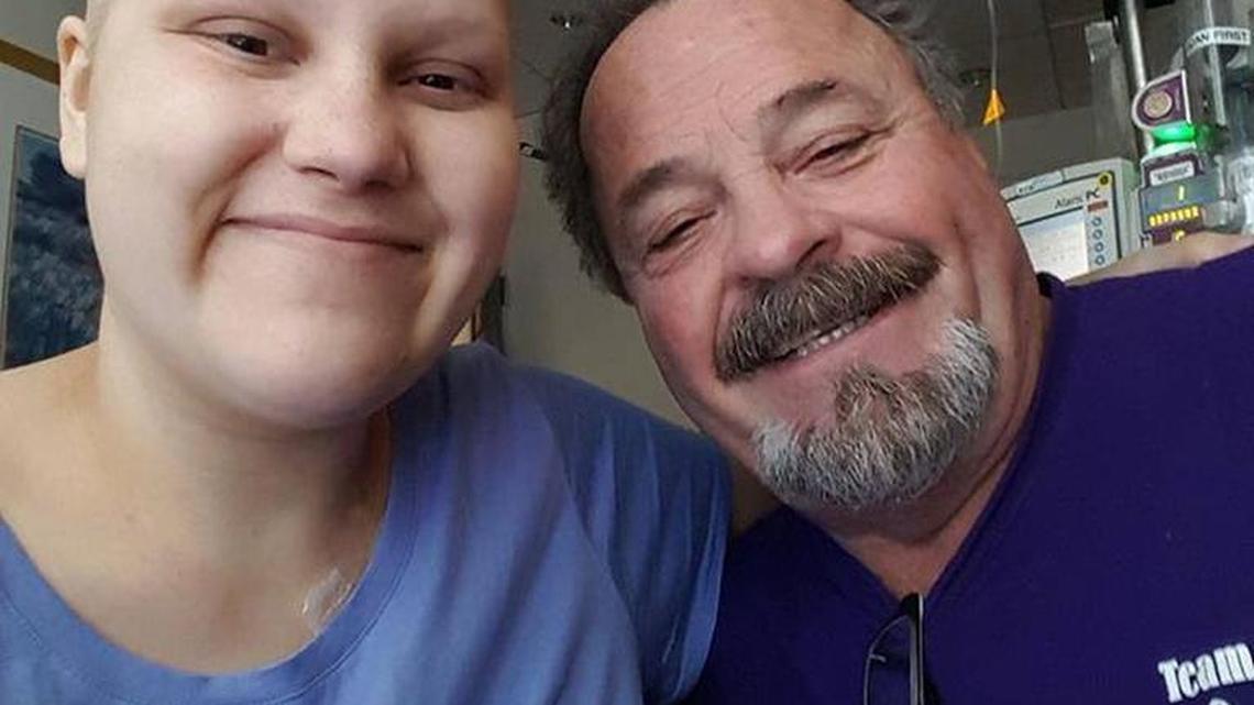 Newman resident Phillip Blanton poses with granddaughter Makayla Farley in the cancer center at Houston Methodist Hospital. Farley, 20, has stage 4 Hodgkin’s lymphoma, and her grandpa took her pot-laced cookies to help ease nausea and other problems.