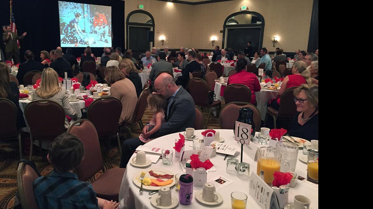 
Master of ceremonies Trevor Carey of iHeart Radio, at left in background, welcomes the crowd at the American Red Cross Gold Country Region Heroes Recognition Event on Wednesday morning at the DoubleTree Hotel in downtown Modesto.

