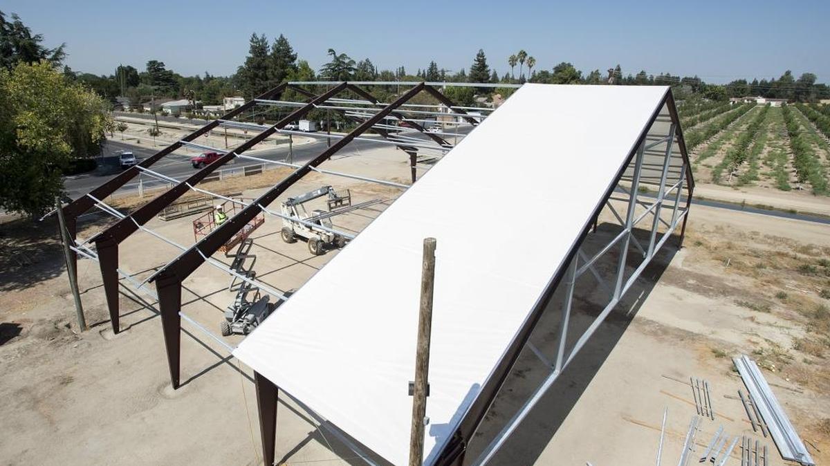 
A new tent structure is being built at R.A.M. Farms in Turlock. 
