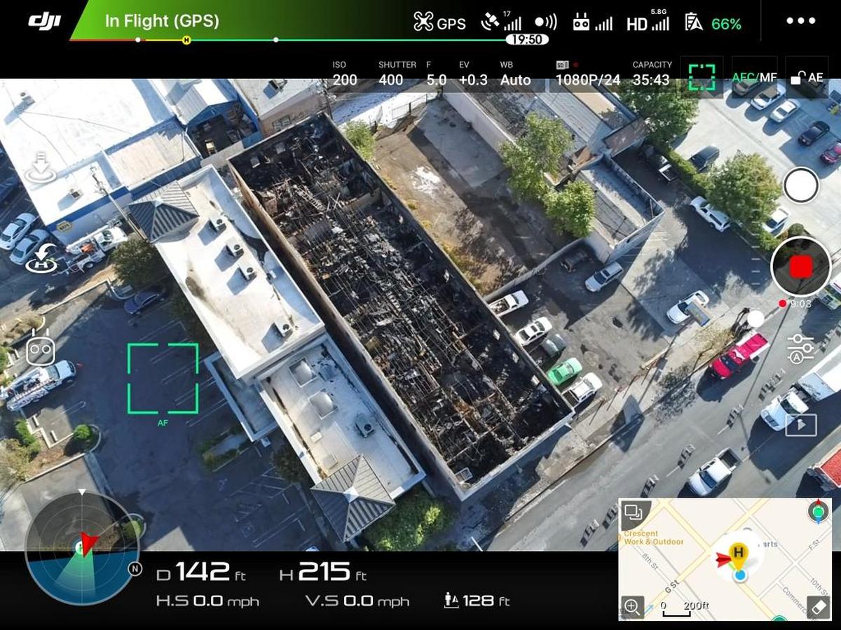 An aerial view of the apartment building on 624 Ninth Street in Modesto, California, on Tuesday, Oct. 3, 2017, a day after a fire tore through the building.