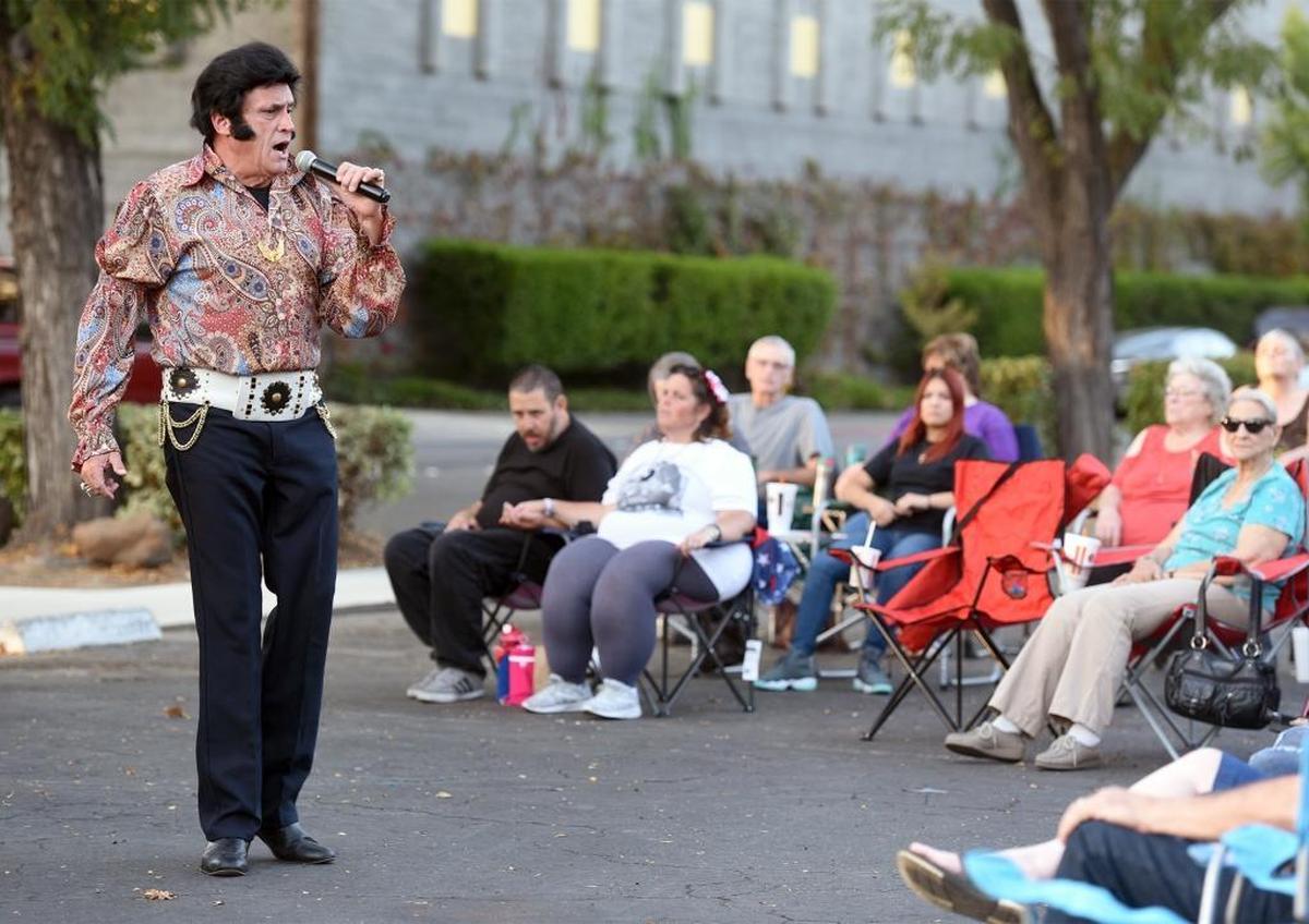 An Elvis Presley impersonator entertains the crowd at A&W on 14th and H streets Friday (09-15-17) in Modesto, Calif.