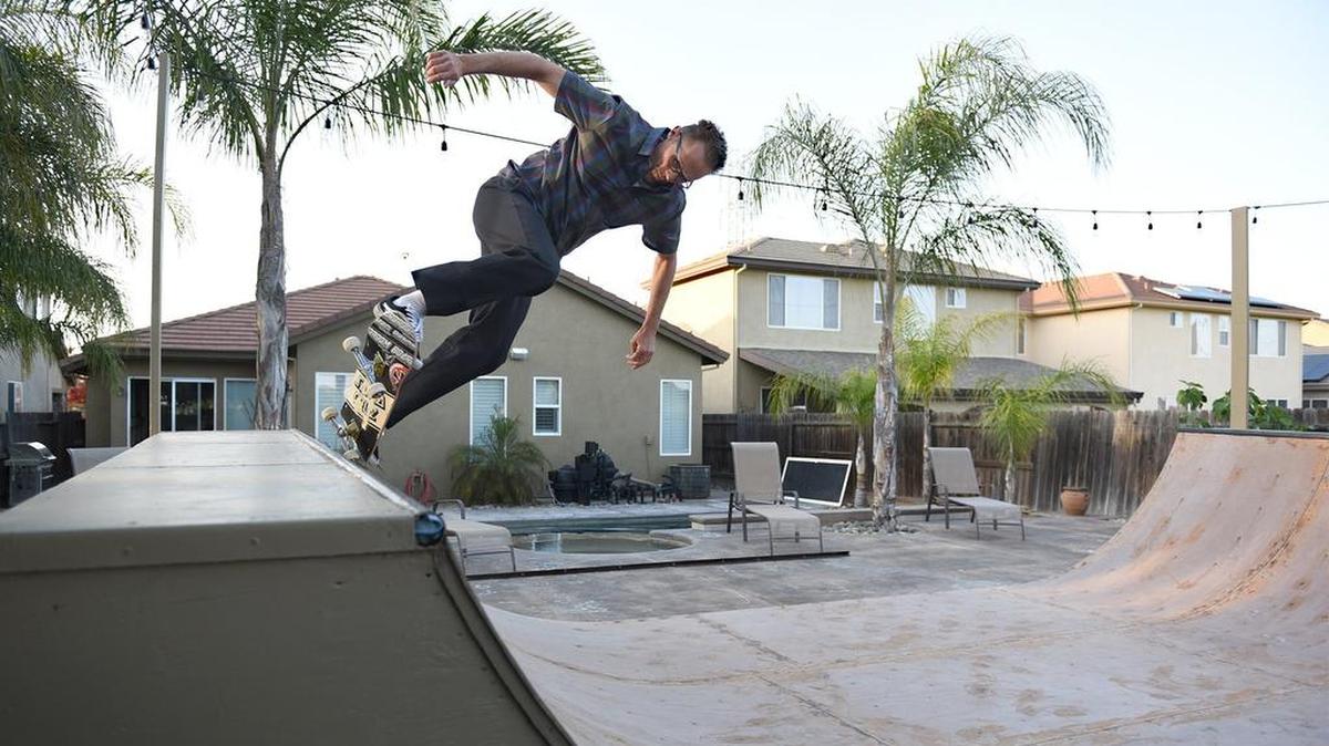 Ken Hoyt skates on his backyard skate ramp on Thursday evening April 12, 2018 in Riverbank, Calif.